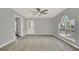 The open living room features a door leading to another room at 809 Deer Glen Ct, Fruitland Park, FL 34731
