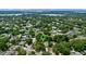 Aerial view of a community near Butler Chain of Lakes, showcasing lush greenery and nearby waterfront at 8655 Shady Glen Dr, Orlando, FL 32819