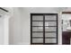 Stylish sliding door with frosted glass panels, adding privacy and elegance to the space at 8655 Shady Glen Dr, Orlando, FL 32819