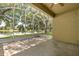 A screened lanai provides outdoor living with pretty water views at 9644 Myrtle Creek Ln, Orlando, FL 32832