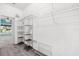 Spacious walk-in closet with shelving and carpet at 9644 Myrtle Creek Ln, Orlando, FL 32832