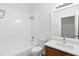 Bright bathroom with a shower-tub combo, updated vanity, and modern fixtures for a refreshed feel at 10914 Savannah Wood Dr # 139, Orlando, FL 32832