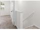 Upstairs hallway featuring carpeted floors with easy access to bedrooms and other living areas at 10914 Savannah Wood Dr # 139, Orlando, FL 32832
