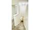 Carpeted stairwell leading to upper level, featuring white walls, handrail, and overhead lighting at 10914 Savannah Wood Dr # 139, Orlando, FL 32832