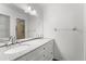 Bathroom with dual sink vanity and granite countertop at 1189 Rib Ave, St Cloud, FL 34771