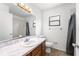 Bathroom featuring a large mirror, vanity, toilet, and shower with curtain at 1189 Rib Ave, St Cloud, FL 34771