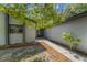 Inviting walkway leading to the front door, with fresh mulch and plant at 1189 Rib Ave, St Cloud, FL 34771