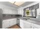 Kitchen features stainless steel dishwasher, undermount sink, and subway tile backsplash at 1189 Rib Ave, St Cloud, FL 34771