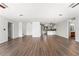 Spacious living area flowing to the kitchen and other rooms, creating a bright and airy feel at 1189 Rib Ave, St Cloud, FL 34771