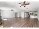 Open floor plan with views to the kitchen with stainless appliances and a breakfast bar at 1189 Rib Ave, St Cloud, FL 34771