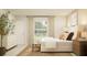 Bright bedroom featuring neutral tones, natural light from the window, and stylish furnishings at 1277 Deepwater Cir, Eagle Lake, FL 33839