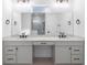 Modern bathroom with double vanity, quartz countertop, sleek fixtures, and large frameless shower at 1394 Kettledrum Trl, Deltona, FL 32725