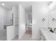 Bathroom featuring a glass shower and vanity with double sinks at 1394 Kettledrum Trl, Deltona, FL 32725