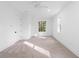 Bright bedroom featuring a ceiling fan and a window offering outdoor views at 1394 Kettledrum Trl, Deltona, FL 32725