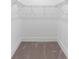 Walk-in closet with wire shelving and carpet at 1394 Kettledrum Trl, Deltona, FL 32725