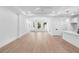 Bright and spacious living room with wood floors and recessed lighting at 1394 Kettledrum Trl, Deltona, FL 32725