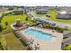 A refreshing community pool and playground offer outdoor relaxation and fun in a well-maintained neighborhood at 1401 Mirabella Cir, Davenport, FL 33897