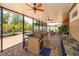 Outdoor kitchen and bar area featuring grill, sink, countertop and brick flooring at 14830 Winkfield Ct, Winter Garden, FL 34787