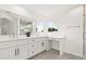 Bright bathroom featuring double sinks, ample storage space and modern fixtures at 14927 Faversham Cir, Orlando, FL 32826