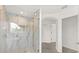 Beautiful bathroom showcasing a marble tiled shower with glass door and modern fixtures at 14927 Faversham Cir, Orlando, FL 32826