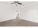 Bright bedroom with view into main bedroom, closet, and carpeted floors at 14927 Faversham Cir, Orlando, FL 32826
