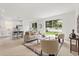 Bright living room with a view of the backyard at 14927 Faversham Cir, Orlando, FL 32826