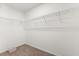 Empty walk-in closet offers ample space for storage and organization at 14927 Faversham Cir, Orlando, FL 32826
