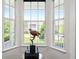 Bay window nook with a view of the outdoors and a decorative bird statue at 152 Riggings Way, Clermont, FL 34711