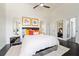 Bright bedroom featuring ceiling fan, en suite bath and closet at 152 Riggings Way, Clermont, FL 34711