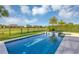 Sparkling pool and spa with lush landscaping create a private oasis at 15769 Shorebird Ln, Winter Garden, FL 34787