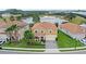 An aerial shot that captures this lovely home, boasting a manicured lawn and complementary landscaping at 1640 Oak Blossom Dr, Davenport, FL 33837