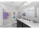 Bathroom featuring double vanity with stone countertop at 1640 Oak Blossom Dr, Davenport, FL 33837