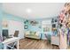 Functional bedroom with desk and futon with lots of natural light at 1640 Oak Blossom Dr, Davenport, FL 33837