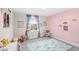 Playful bedroom featuring brightly colored decorations at 1640 Oak Blossom Dr, Davenport, FL 33837