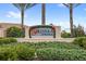 The Solterra Springs community sign surrounded by lush landscaping with red bows and wreaths at 1640 Oak Blossom Dr, Davenport, FL 33837