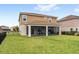 Exterior view of home and backyard at 1640 Oak Blossom Dr, Davenport, FL 33837