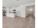 Open-concept kitchen and living area with modern appliances and ample counter space at 2089 Rosewood Dr, Bartow, FL 33830