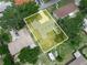 Aerial view showcasing property lines, home, and surrounding landscape at 228 Kilmer Ln, Winter Haven, FL 33884