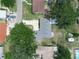 Aerial shot displaying the property's layout, featuring the home, driveway, and surrounding neighborhood at 228 Kilmer Ln, Winter Haven, FL 33884