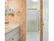 Hall bathroom features single sink vanity and a standing shower at 228 Kilmer Ln, Winter Haven, FL 33884