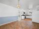 Bright kitchen features white cabinets, tile floors, and modern appliances at 228 Kilmer Ln, Winter Haven, FL 33884