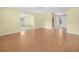 This light-filled living room features new floors, neutral paint and an open layout at 228 Kilmer Ln, Winter Haven, FL 33884