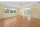 This light-filled living room features new floors, neutral paint and an open layout at 228 Kilmer Ln, Winter Haven, FL 33884