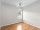This bedroom offers hardwood floors and a bright window letting in natural light at 2280 Yorville Ct, Ocoee, FL 34761