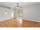 Bright living area features hardwood floors and sliding doors to outdoor space at 2280 Yorville Ct, Ocoee, FL 34761