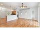 Open-concept living room showcases hardwood floors and plentiful natural light at 2280 Yorville Ct, Ocoee, FL 34761