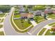 A bird's eye view of a single Gathering home on a corner lot with a well maintained lawn at 2406 Placid Way, Kissimmee, FL 34758