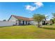 A lovely single-story home with a well-maintained yard and charming curb appeal at 2406 Placid Way, Kissimmee, FL 34758