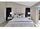 Spacious bedroom features plush bedding and black-out curtains for maximum comfort at 2406 Placid Way, Kissimmee, FL 34758