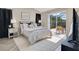 Spacious bedroom with light herringbone floors and direct access to screened-in pool at 2406 Placid Way, Kissimmee, FL 34758